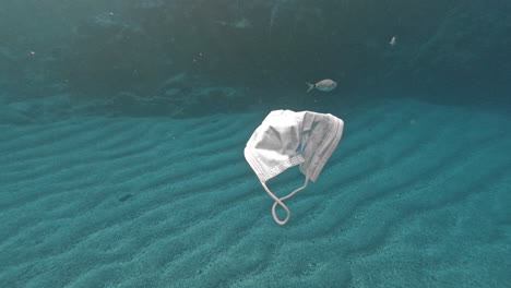 Polluting-the-ocean---floating-medical-mask