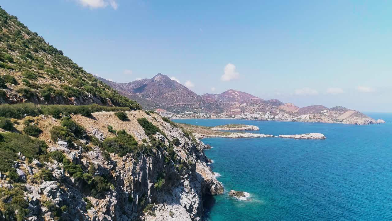 A shot from a drone of a road on the coast of the Greek island of Crete