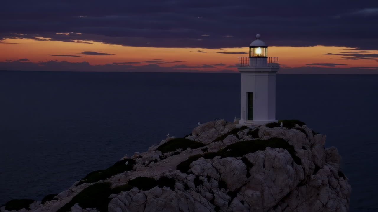 Lighthouse at Sunset over the Ocean