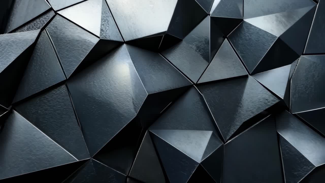 A black and white image of a wall with many triangles. The image has a modern and abstract feel to it