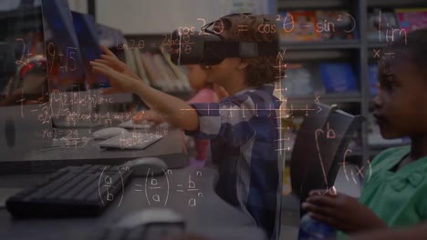 mathematical equations floating against caucasian boy wearing vr headset at elementary school