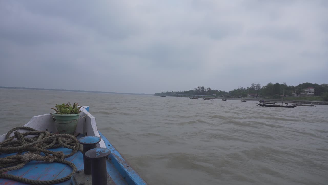 A boat is sailing on the Ganges River.