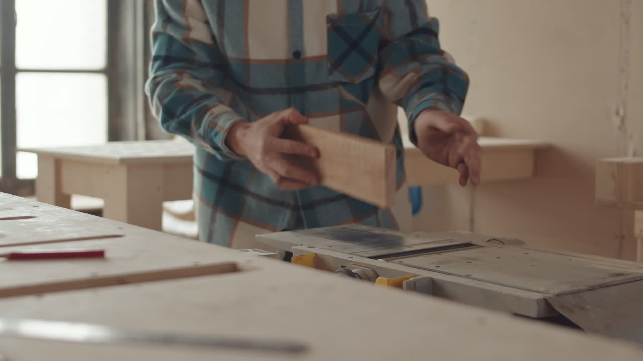 Unrecognizable Joiner Using Wood Router while Working