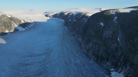 drone footage of longest glacier arm in europe - tunsbergdalsbreen glacier jotedalsbreen national park, norway