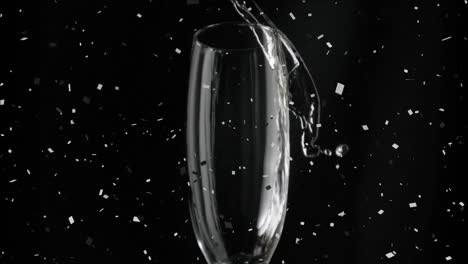 animation of champagne pouring into glass with confetti falling on black background