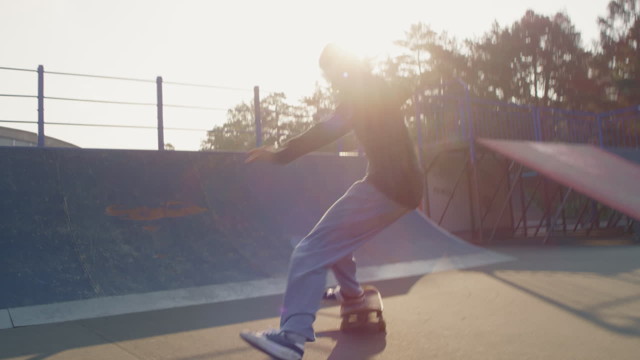 Skater Attempting Kickflip and Falling