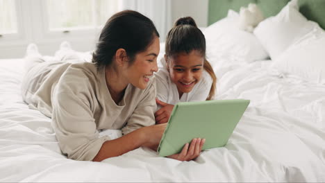 family, bed and tablet in a home with digital