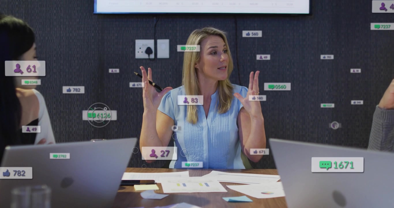 Main speaker gesturing in business meeting sparking floating likes and fan counts indicating growth