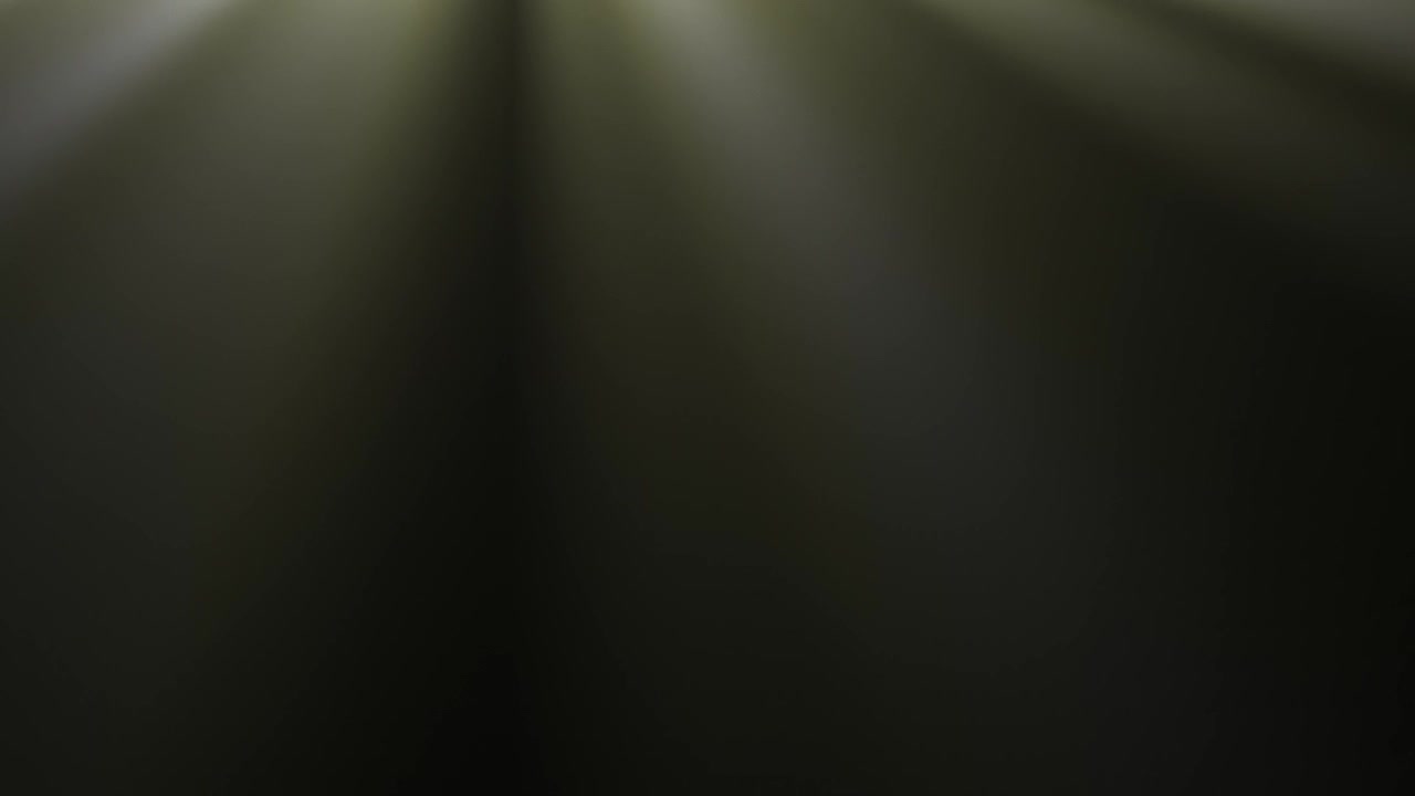 Volumetric Light Rays Shining Down on a Dark Background