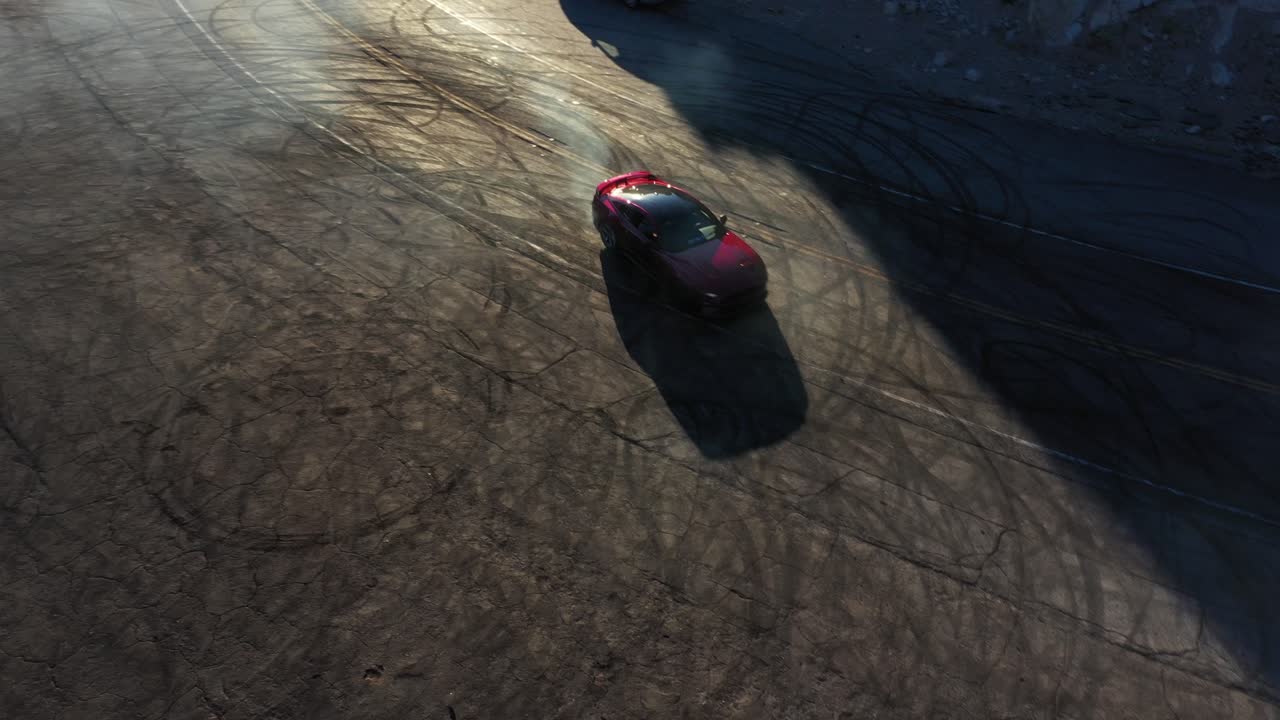 Red Ford Mustang Drifting