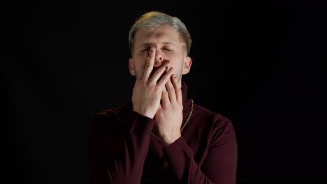 stylish young man with blue eyes looking at camera, posing, feeling happiness, fun, enjoyment