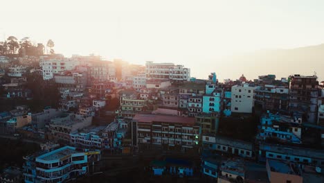sunrise over a hillside town