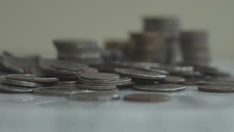 a stack of coins - american quarters - being focused on