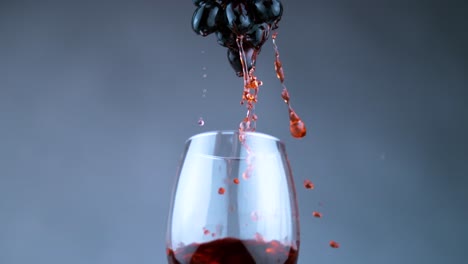 the wine flows elegantly from a grape into a wine glass, illustrating the concept of fluidity and abundance in nature