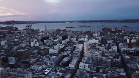 flying towards church over montevideo sunset