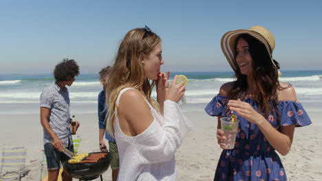 Young-women-with-drinks-talking-with-each-other-4k