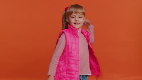 Young-little-school-children-girl-listening-music-smiling-dancing-disco-party-having-fun-celebrating