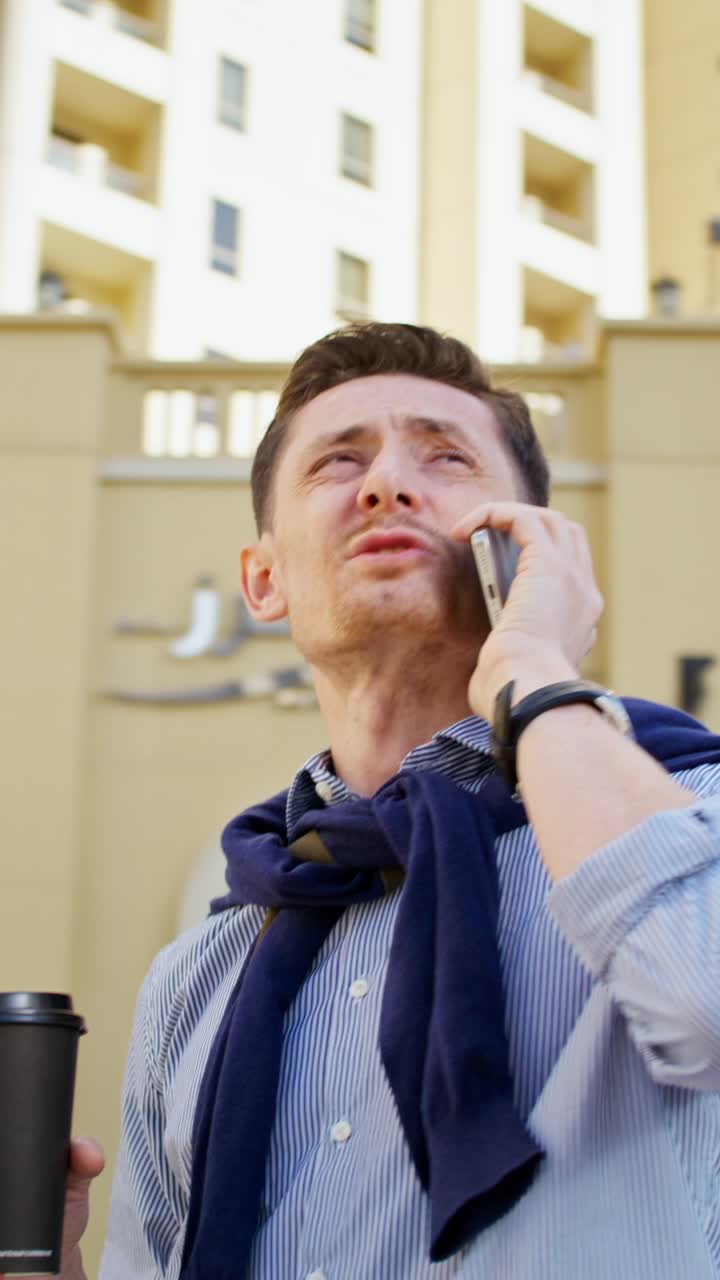 Man on a phone call outdoors