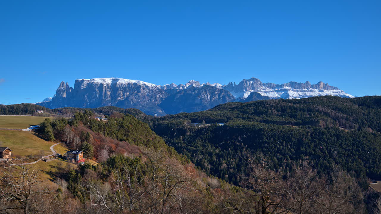 Distant view of snow on the mountains in the Dolomites, Italy