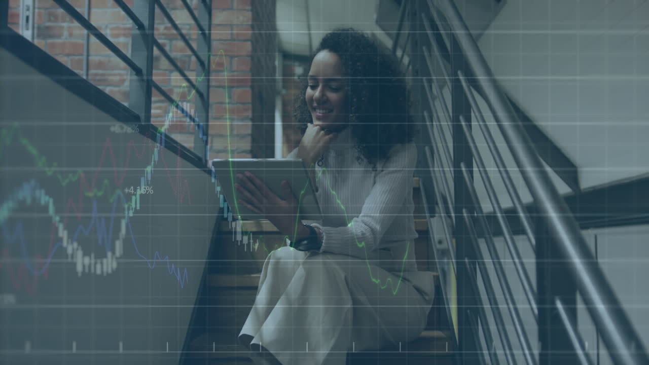 Animation of financial data processing over biracial businesswoman using tablet