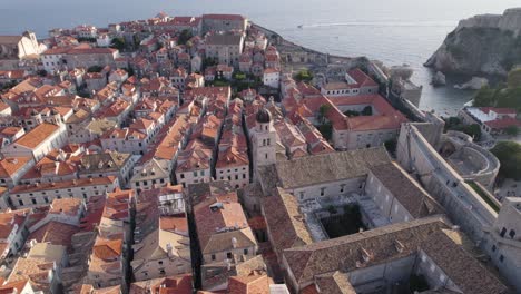 Dubrovnik,-Croatia:-Aerial-over-Franciscan-Church,-Monastery-and-coastline