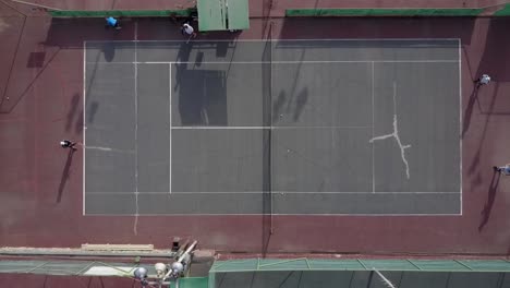 aerial view of tennis court with players