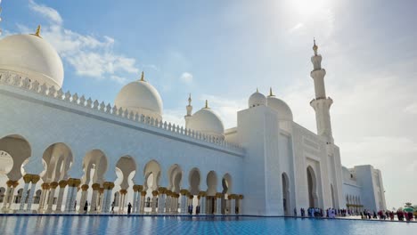 abu dhabi city sunny day grand mosque front pool facade panorama 4k timelapse uae