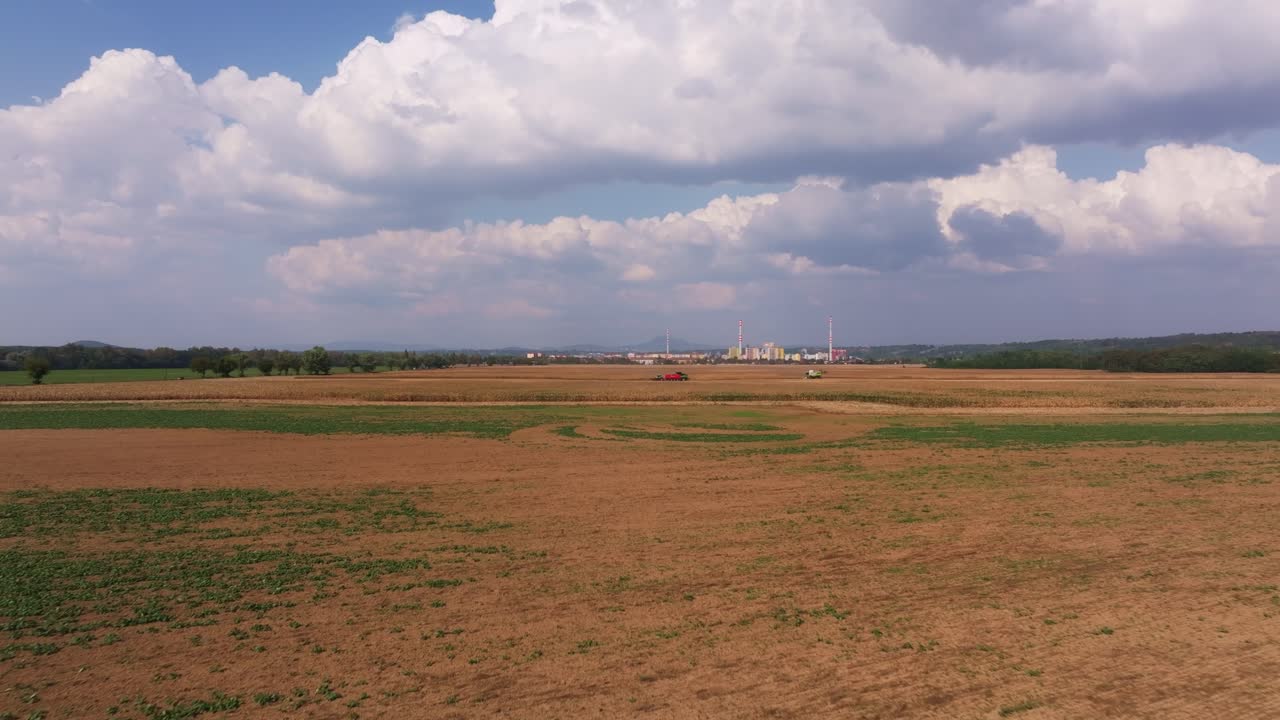 Aerial view of grain harvesting in Steti's countryside, Czech Republic
