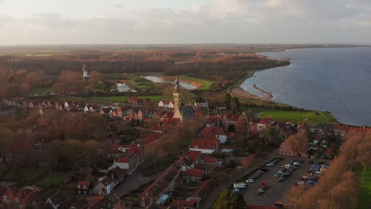 Revealing drone shot of the touristic city Veere during winter