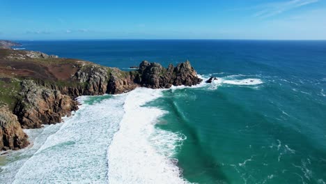 ocean waves along cornish coastline on a summer's day, england, uk