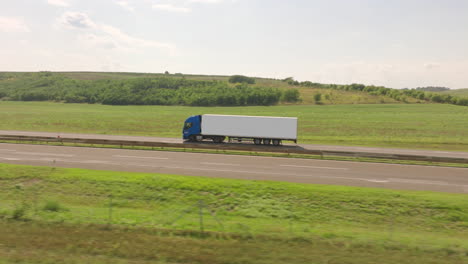 truck on highway through countryside