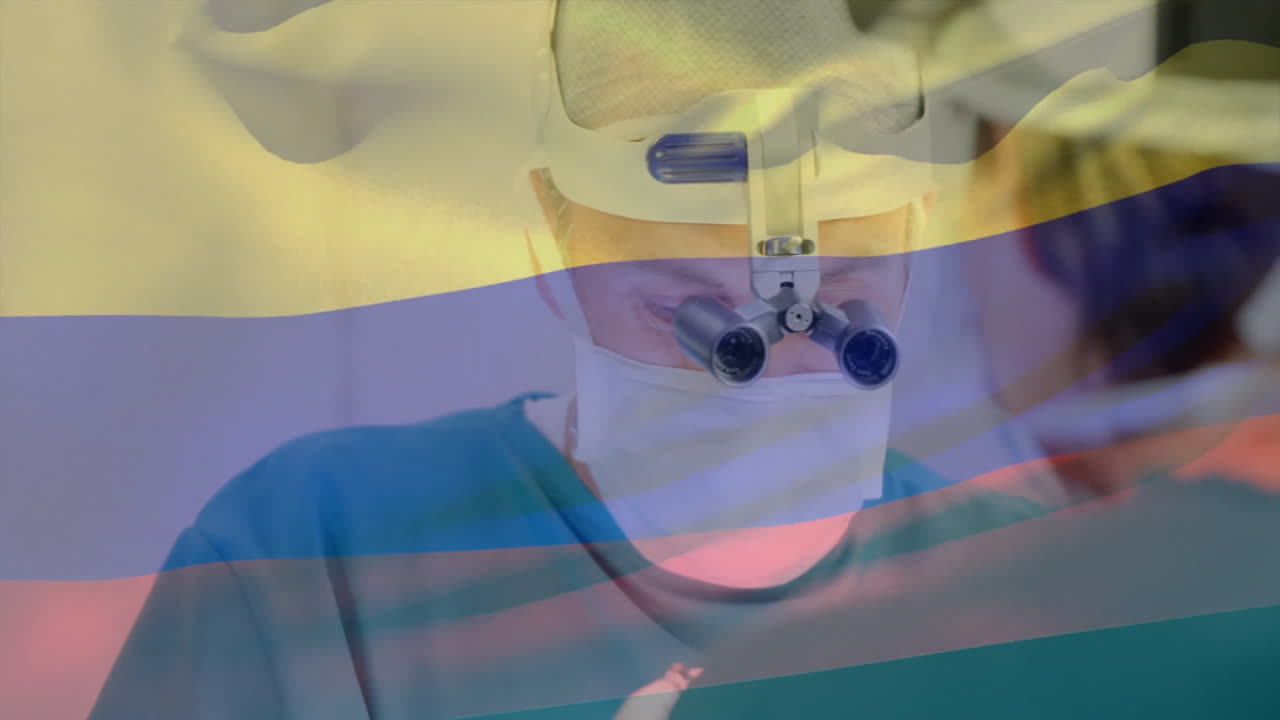 Animation of flag of colombia over caucasian surgeons during surgery