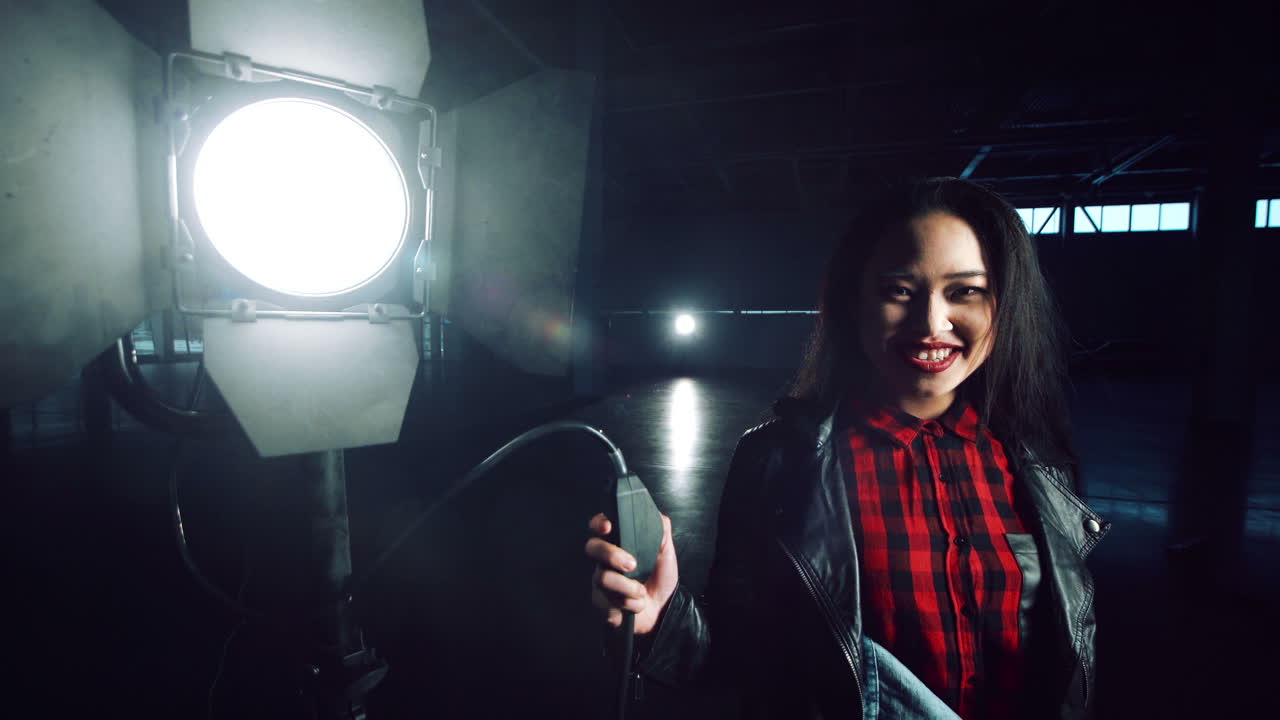 Woman in Studio with Lighting