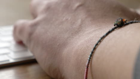 typing-hands-on-a-keyboard-closeup-with-camera-movement