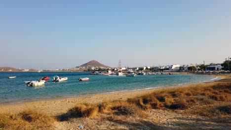 static shot of loads of boats with their anchor dropped