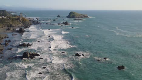 4k drone footage of waves and rocks on brookings oregon beach coastline