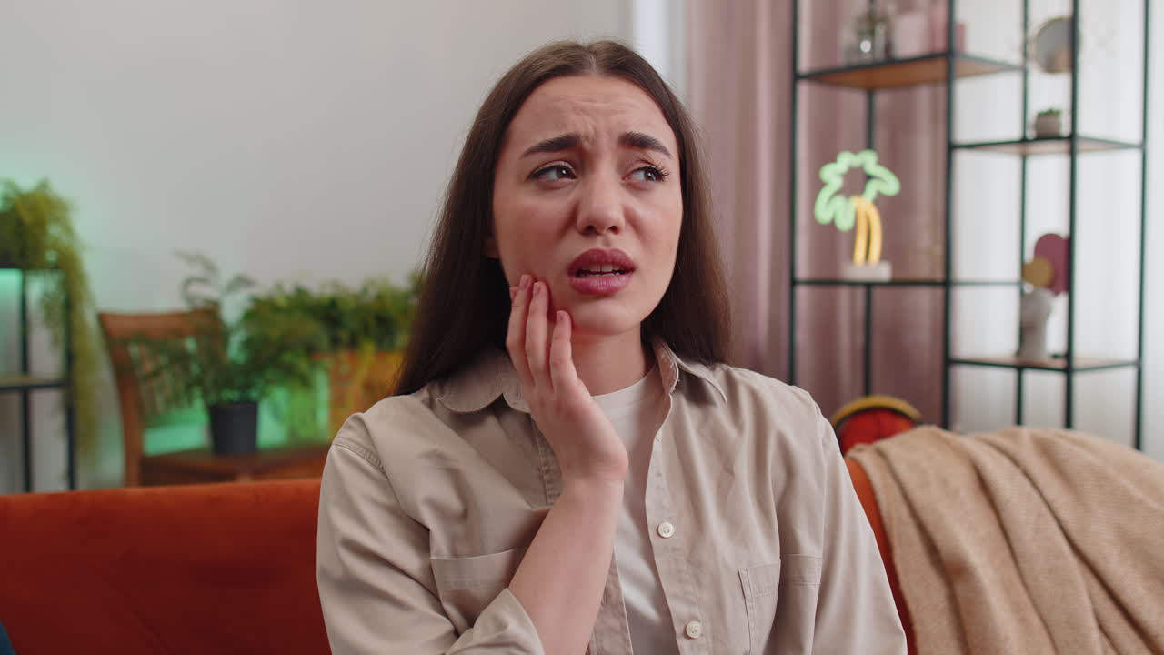 Dental problems young woman touching cheek suffer from painful toothache sensitive teeth cavities