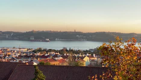 alfama in autumn season along the river tagus in lisbon