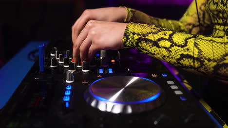 woman djing at the disco