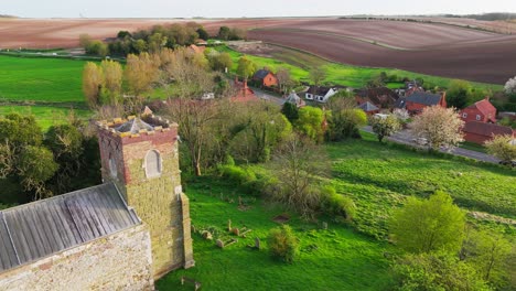 aerial drone footage of a small lincolnshire village called burwell in the uk