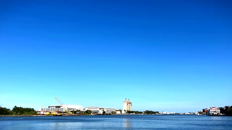 beautiful cityscape with river and blue sky
