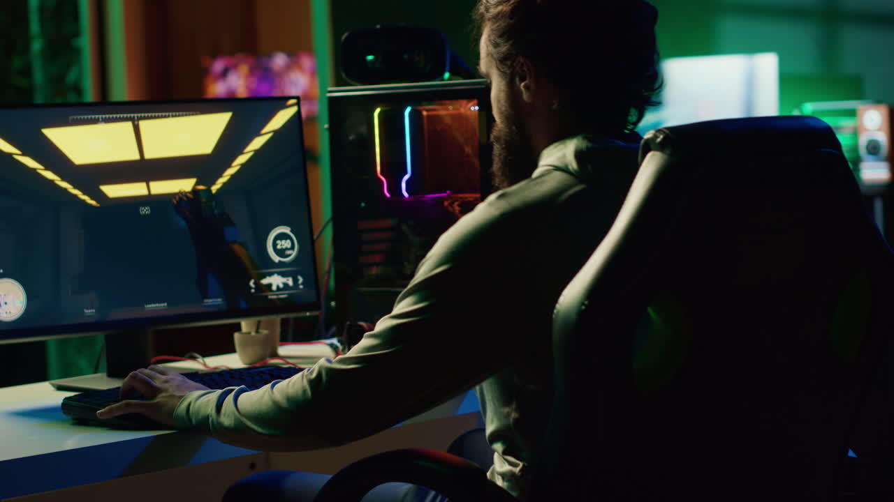 Man sitting on gaming chair, playing first person shooter videogame with gun shooting laser bullets