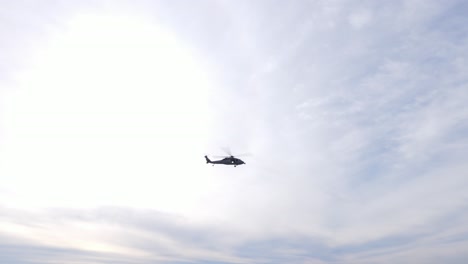 Drone-view-of-helicopter-flying-by