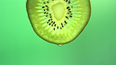 kiwi and droplet slow motion.