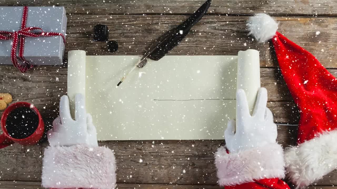 animación de la nieve cayendo sobre la carta a santa claus en la mesa