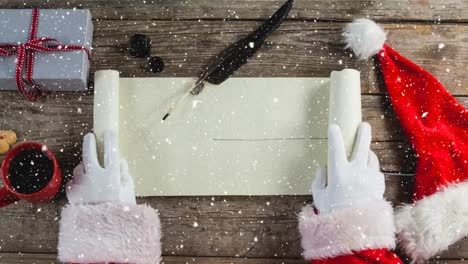 animation of snow falling over letter to santa claus on the table