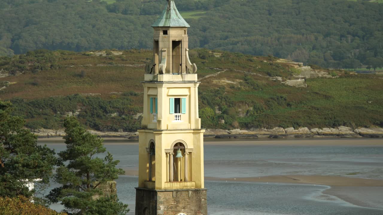 Tower Of Portmeirion With Hills And River In The Background, Italian Style Tourist Village On The Coast Of North Wales, UK
