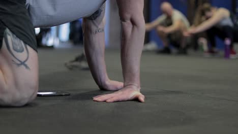 various shots of an athlete and equipment in a crossfit gym