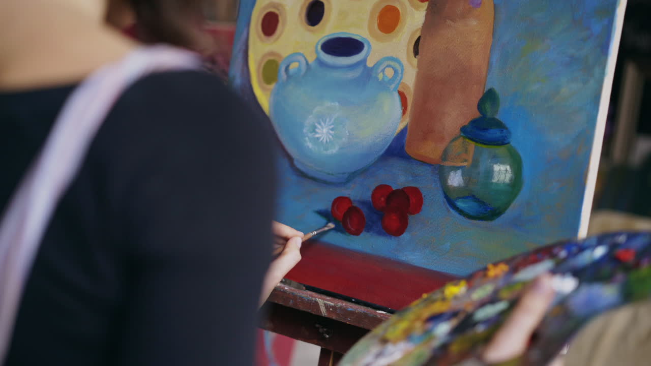 Woman Painting a Still Life in an Art Studio