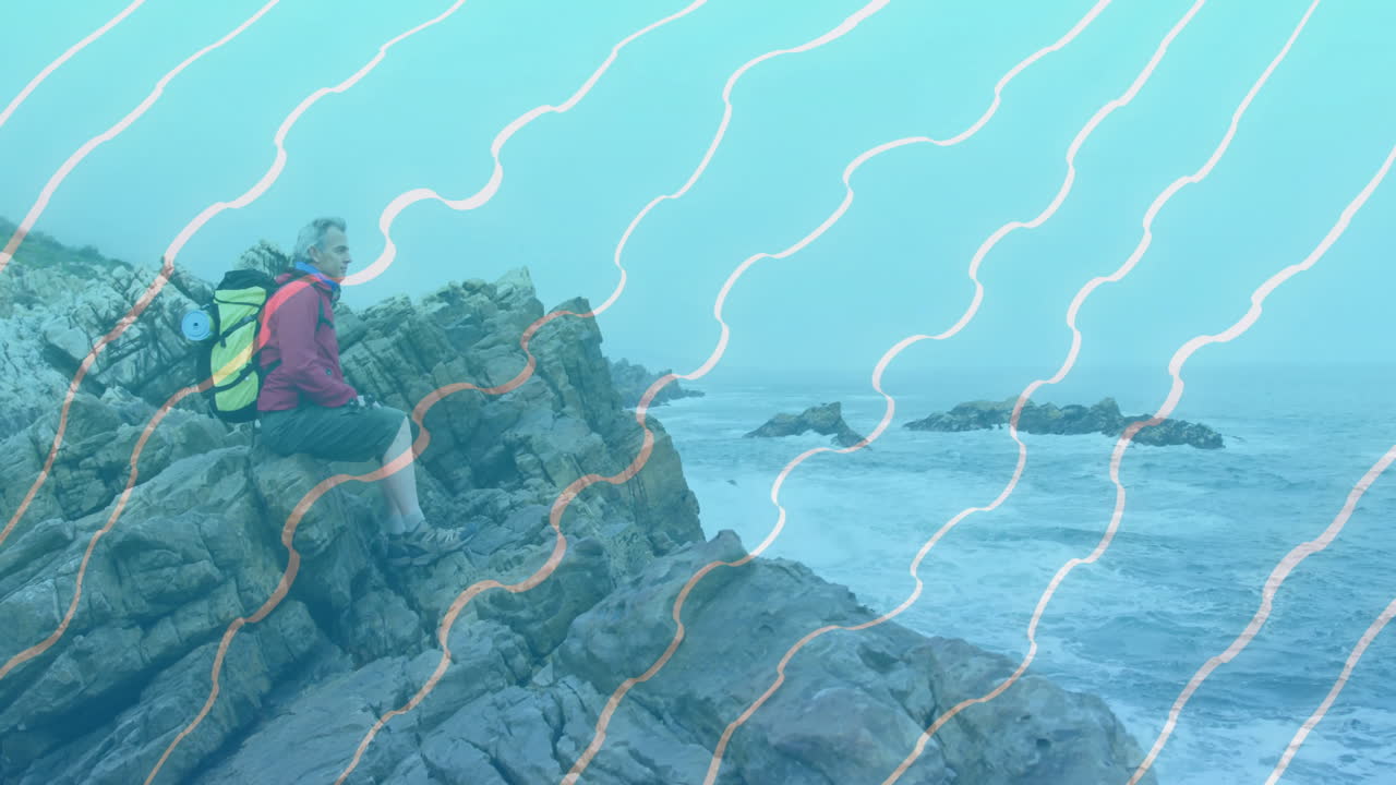 Male hiker sitting on rugged coast, displaying travel marketing data overlay and animated map